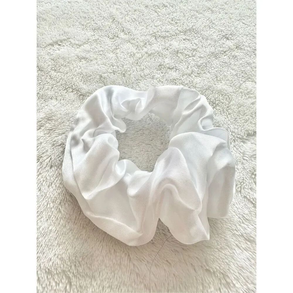 Bright white color satin hair scrunchie